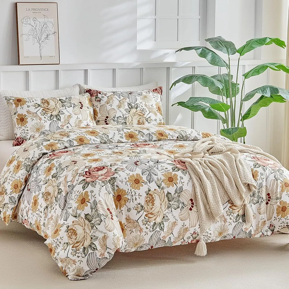 Funda nórdica Lekesky flores de colores sobre una cama